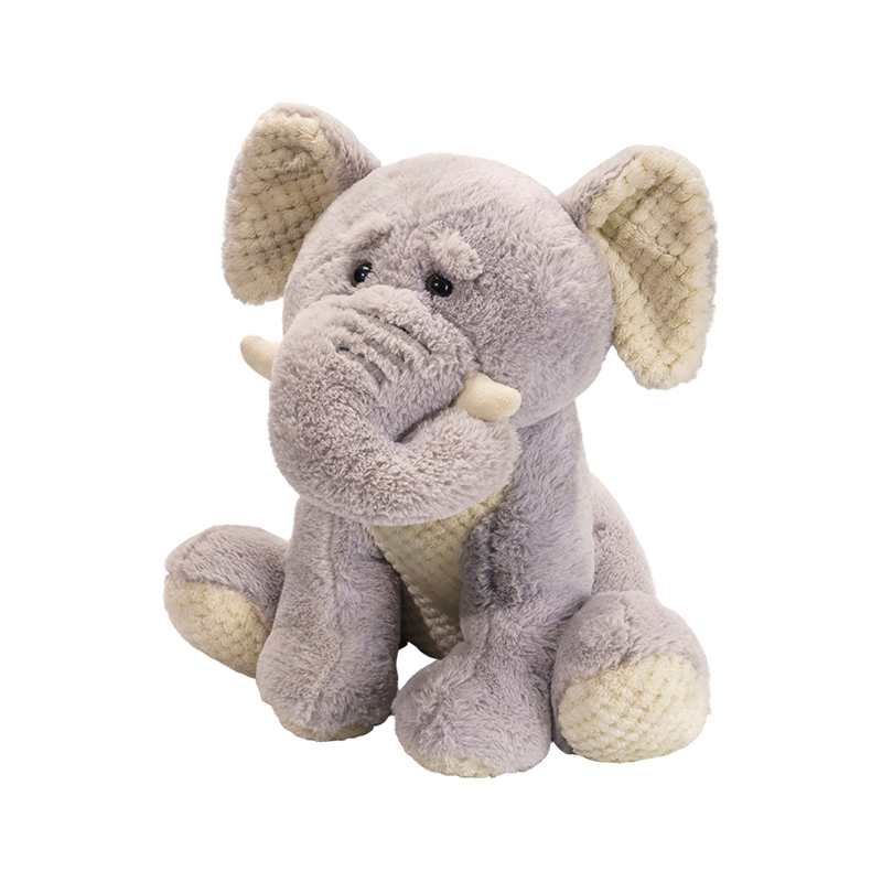 긴 코와 큰 귀를 가진 앉아있는 코끼리 봉제 인형